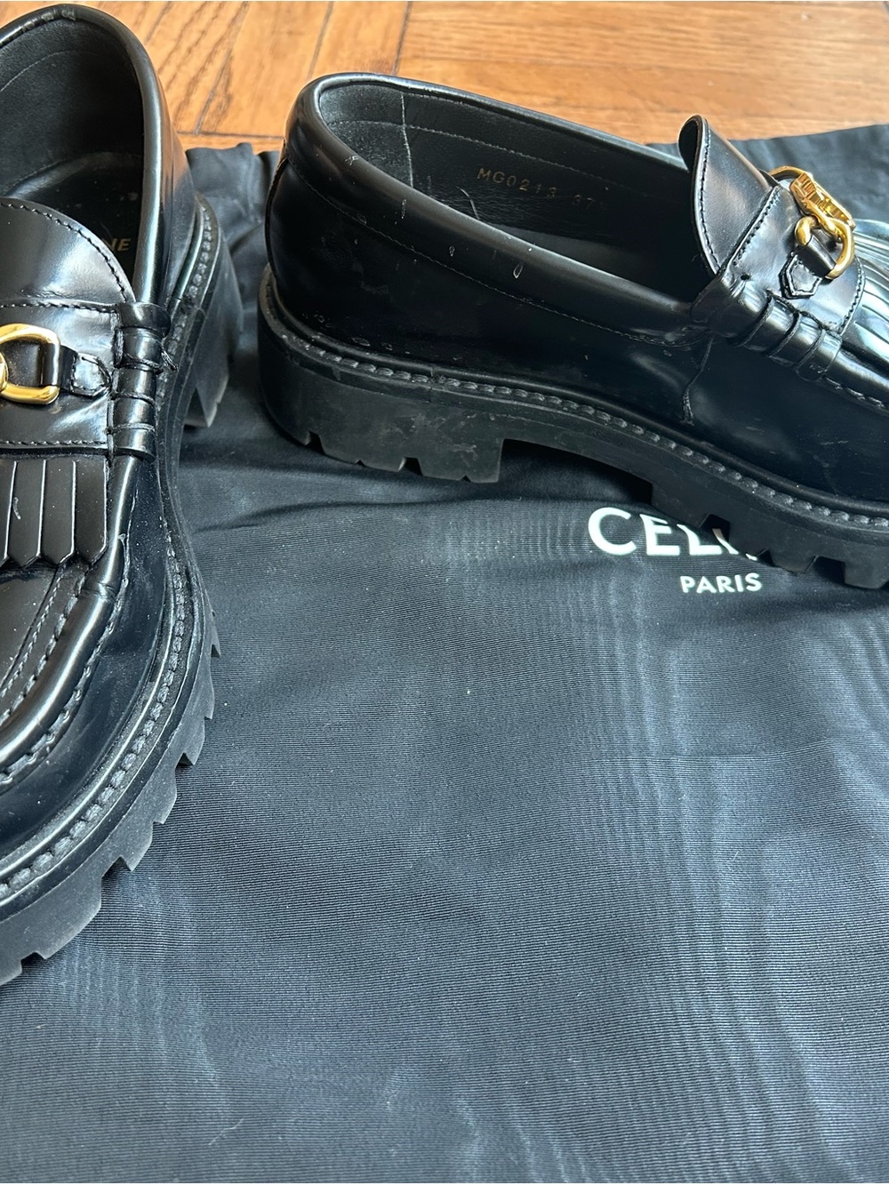 Celine Black Leather Fringe Loafers with Gold Chain Accent - Picture 2 of 9